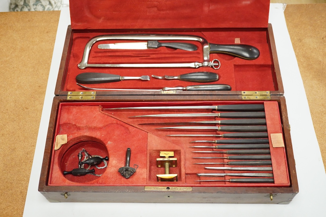 A 19th century surgeon’s set signed Mon. Charriere, Collin & Cie., Paris, in a fitted mahogany case, comprising of steel surgeons instruments; knives, scalpels, scoops, tourniquet, saws, rasps, some instruments stamped w